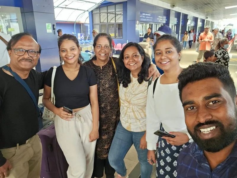 Fransis chauffeur profile with happy Sri Lanka travelers