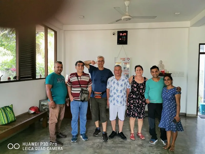 Kumara chauffeur profile with happy Sri Lanka travelers