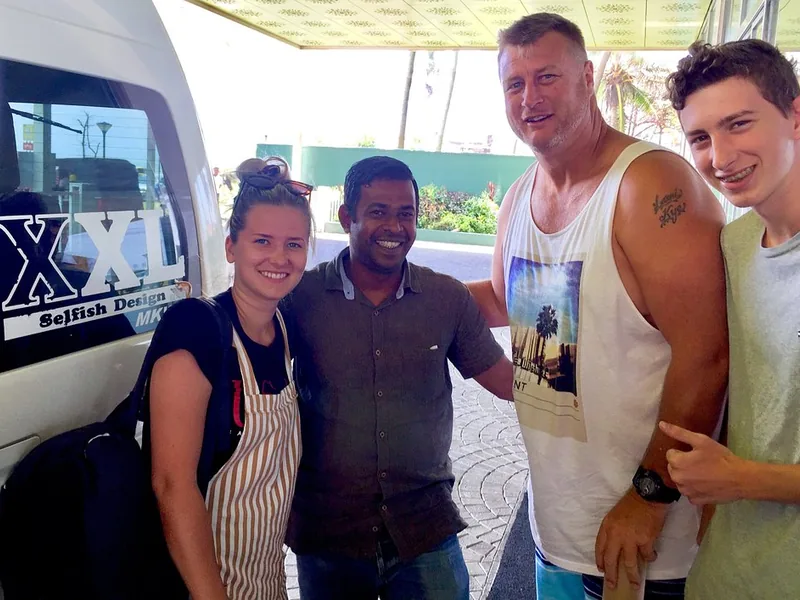 Neal chauffeur profile with happy Sri Lanka travelers